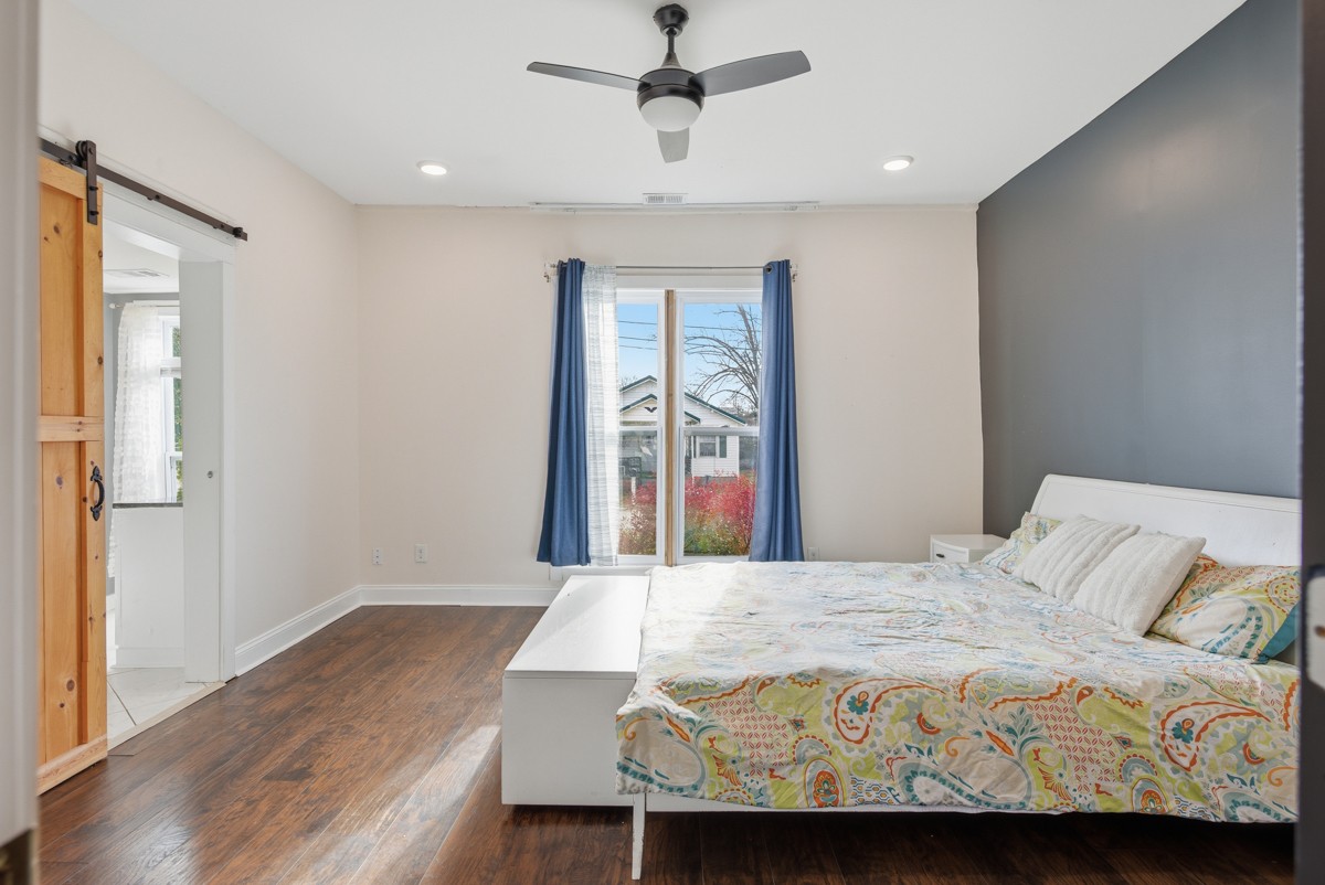 107 East Ward Street Centerville, TN 37033 - Photo 13 of 34 a bedroom with a bed and a window