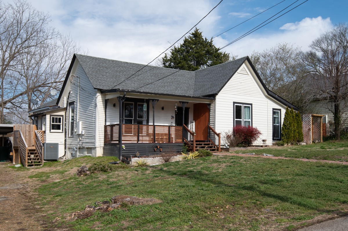 107 East Ward Street Centerville, TN 37033 - Photo 2 of 34 a front view of a house with a yard