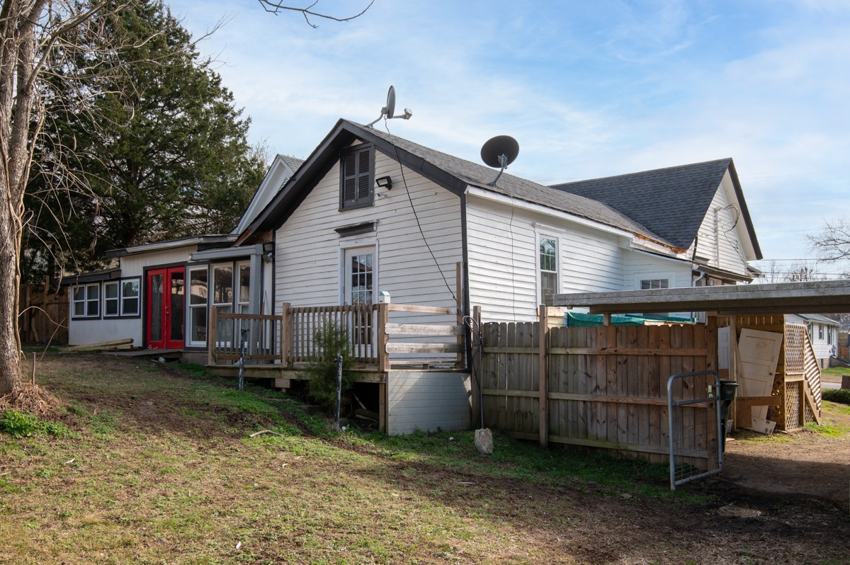 107 East Ward Street Centerville, TN 37033 - Photo 31 of 34 a view of a small house and a yard