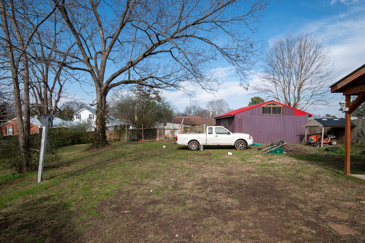 107 East Ward Street Centerville, TN 37033 - Photo 33 of 34 a white house that has a tree in front of it