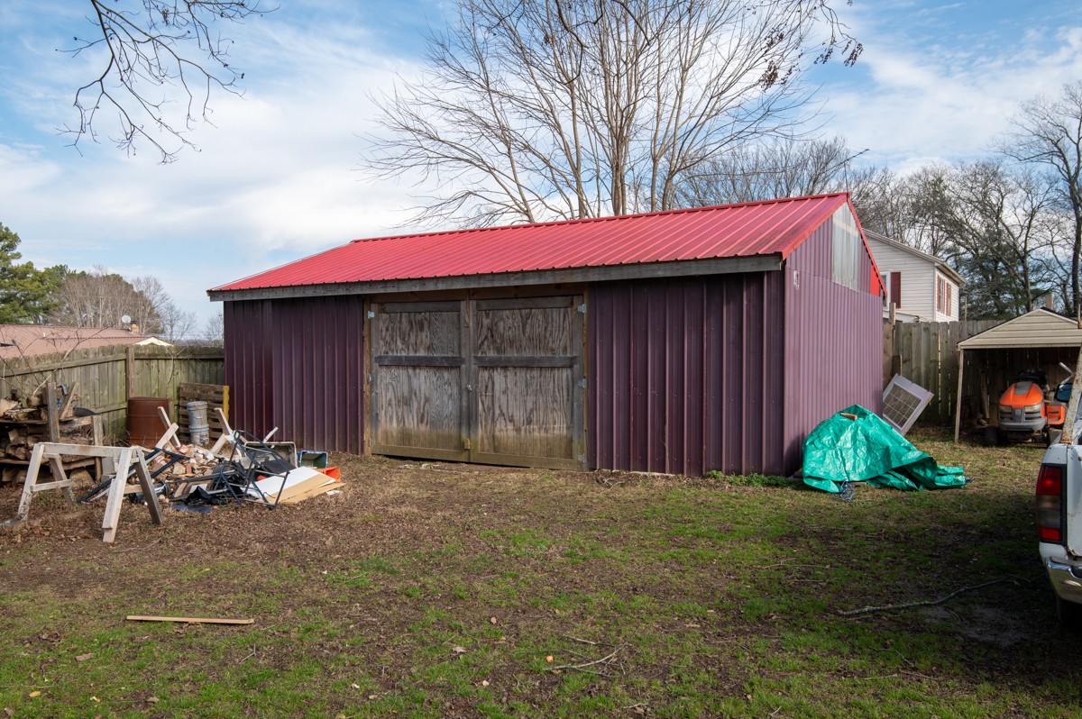107 East Ward Street Centerville, TN 37033 - Photo 34 of 34 a view of a chair and table in backyard of the house