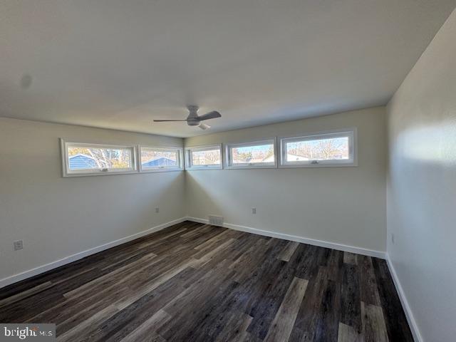 10 Loockerman Court Dover, DE 19901 - Photo 13 of 15 a view of wooden floor and windows in a room