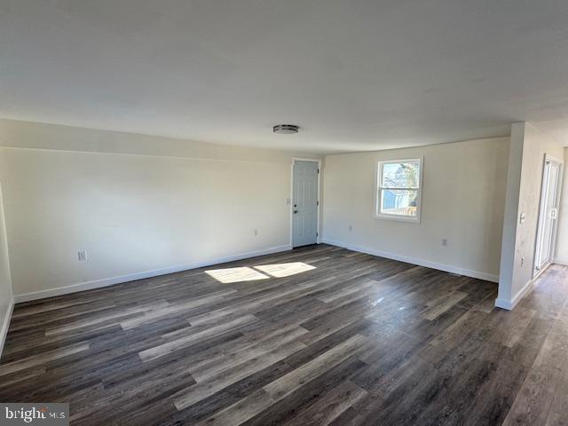 10 Loockerman Court Dover, DE 19901 - Photo 9 of 15 an empty room with wooden floor and windows