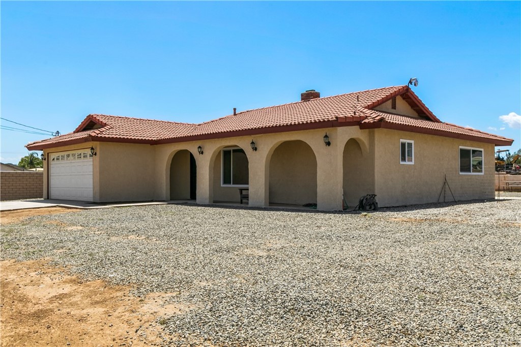 18931 Dallas Avenue Riverside, CA 92508 - Photo 1 of 1 a white house with a outdoor space