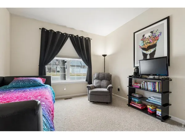 a kitchen with a stove a sink and cabinets