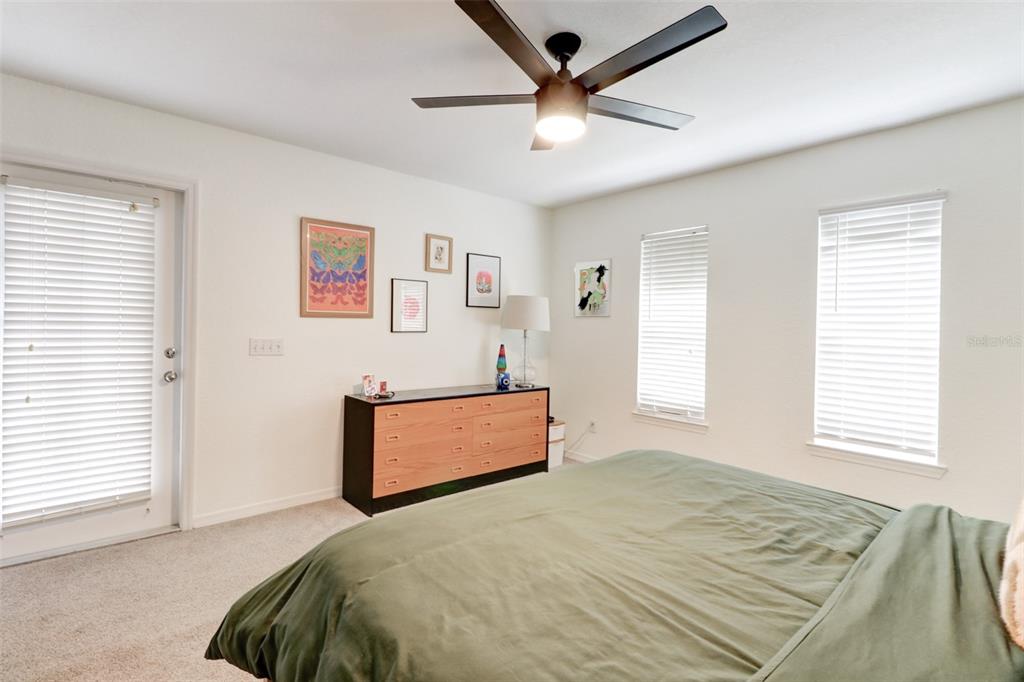 4004 Foxtail Palm Court, Unit 4004 Tampa, FL 33624 - Photo 20 of 49 a bedroom with a large bed and a window