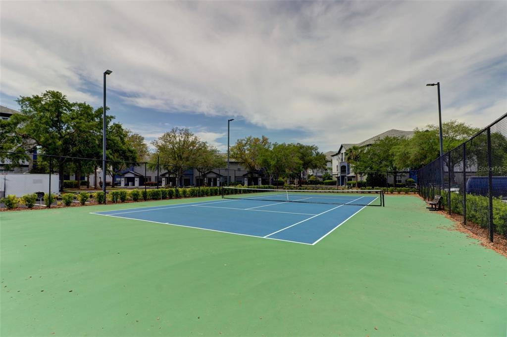 4004 Foxtail Palm Court, Unit 4004 Tampa, FL 33624 - Photo 45 of 49 a view of a playground and basketball court
