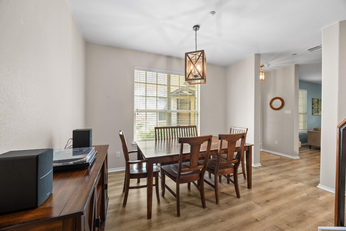 1310 West Parmer Lane, Unit 9B Austin, TX 78727 - Photo 13 of 38 a view of a dining room with furniture
