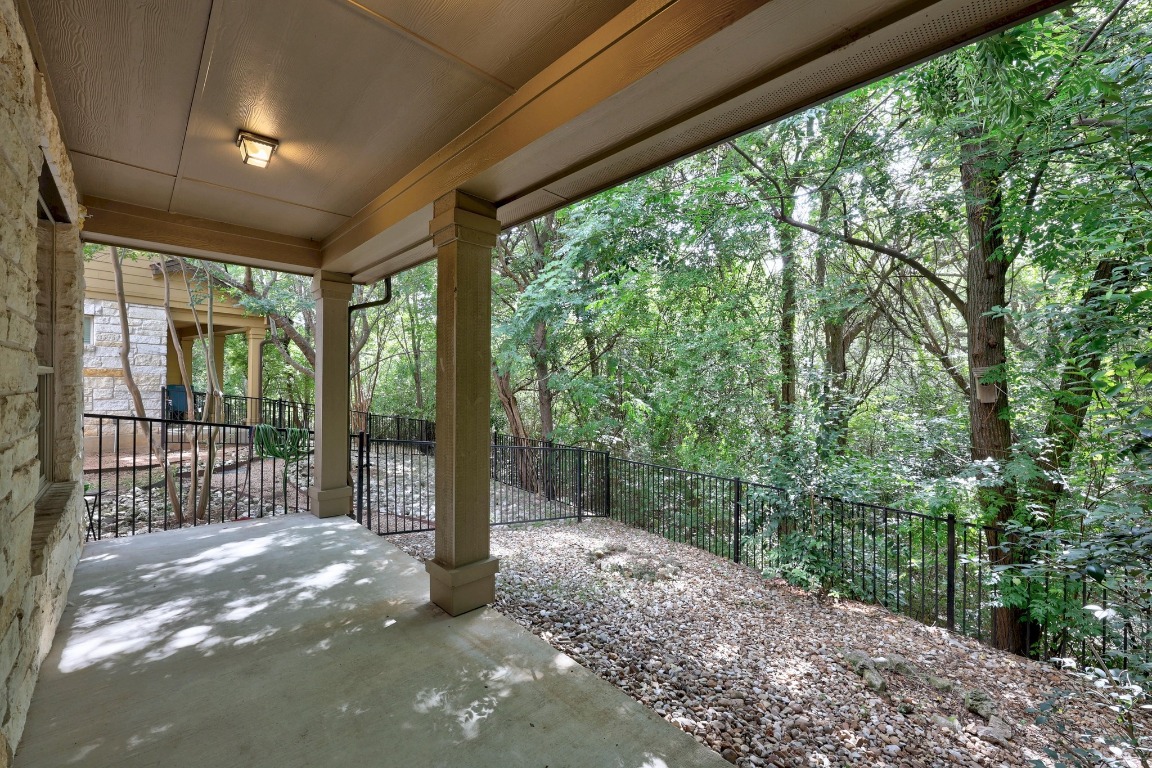 1310 West Parmer Lane, Unit 9B Austin, TX 78727 - Photo 27 of 38 a view of a porch with a trees