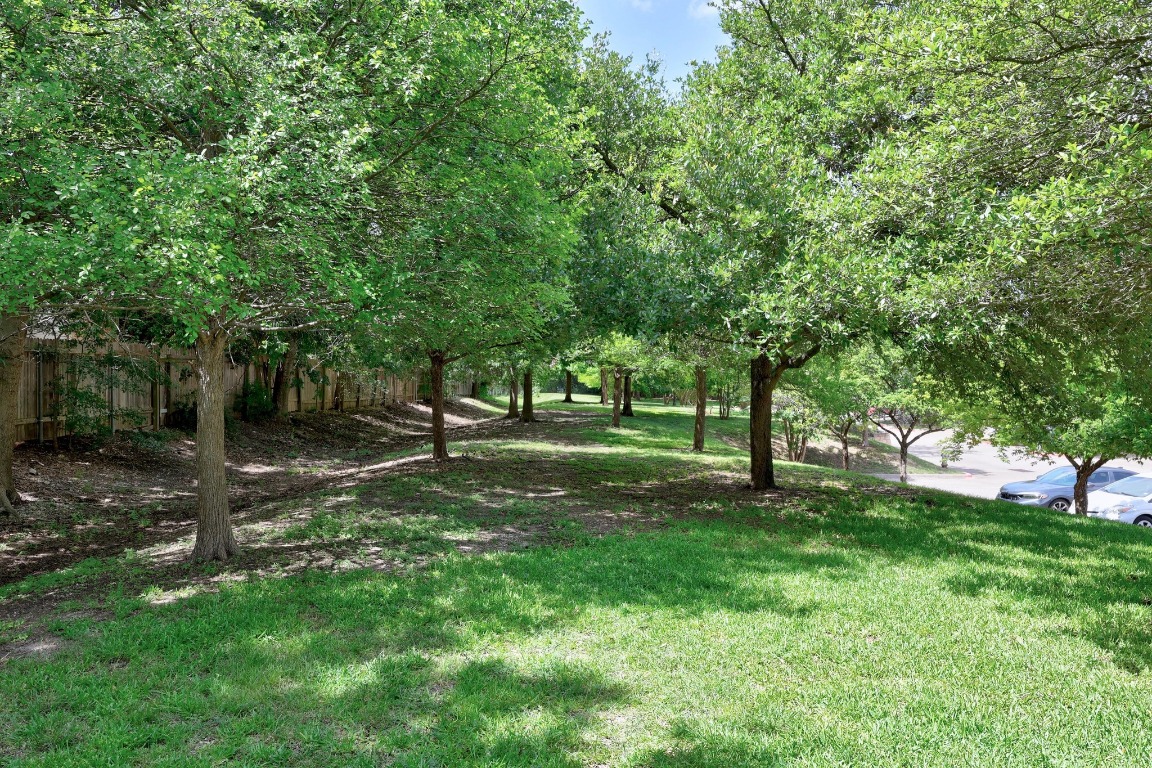 1310 West Parmer Lane, Unit 9B Austin, TX 78727 - Photo 36 of 38 a view of a park with large trees