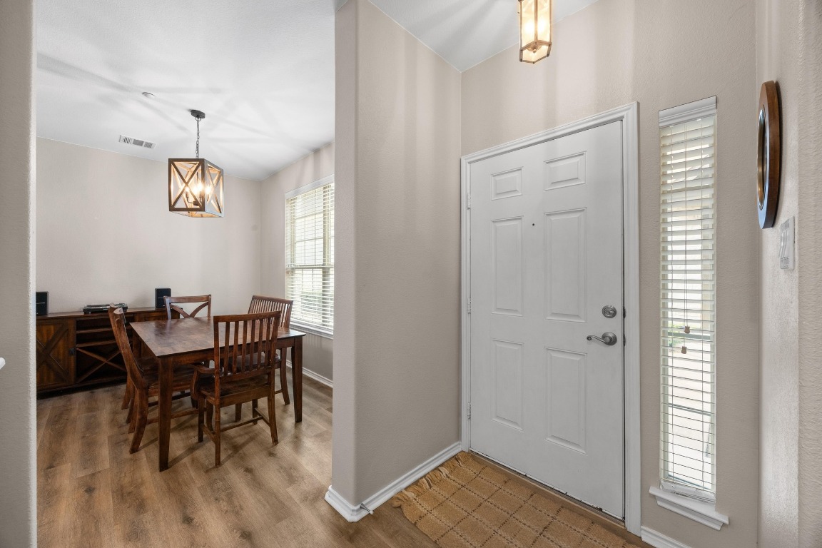 1310 West Parmer Lane, Unit 9B Austin, TX 78727 - Photo 4 of 38 a dining room with furniture and window