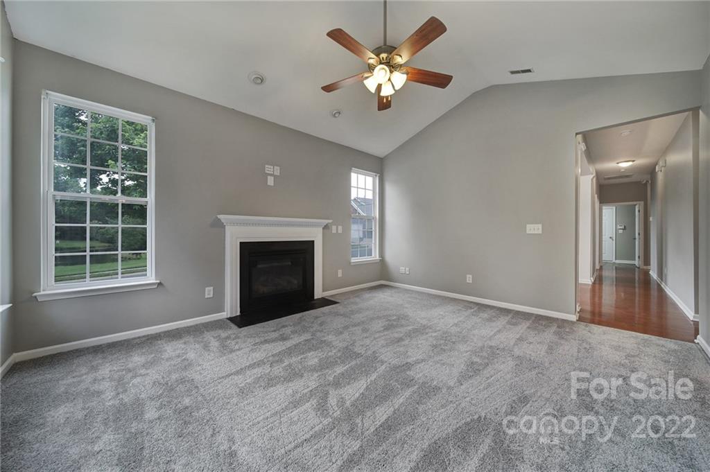 1704 Quartz Lane Fort Mill, SC 29708 - Photo 12 of 39 a view of empty room with a fireplace