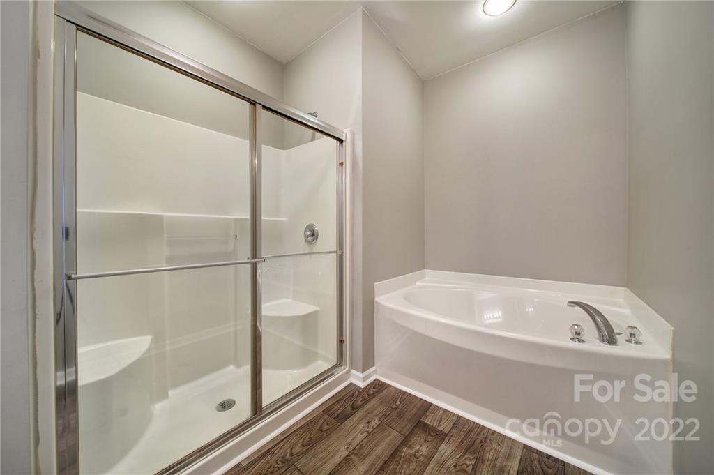 1704 Quartz Lane Fort Mill, SC 29708 - Photo 17 of 39 a bathroom with a bathtub and a shower