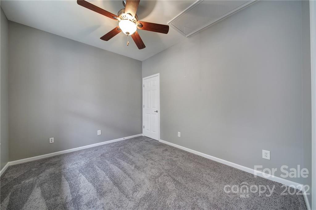 1704 Quartz Lane Fort Mill, SC 29708 - Photo 19 of 39 an empty room with chandelier fan