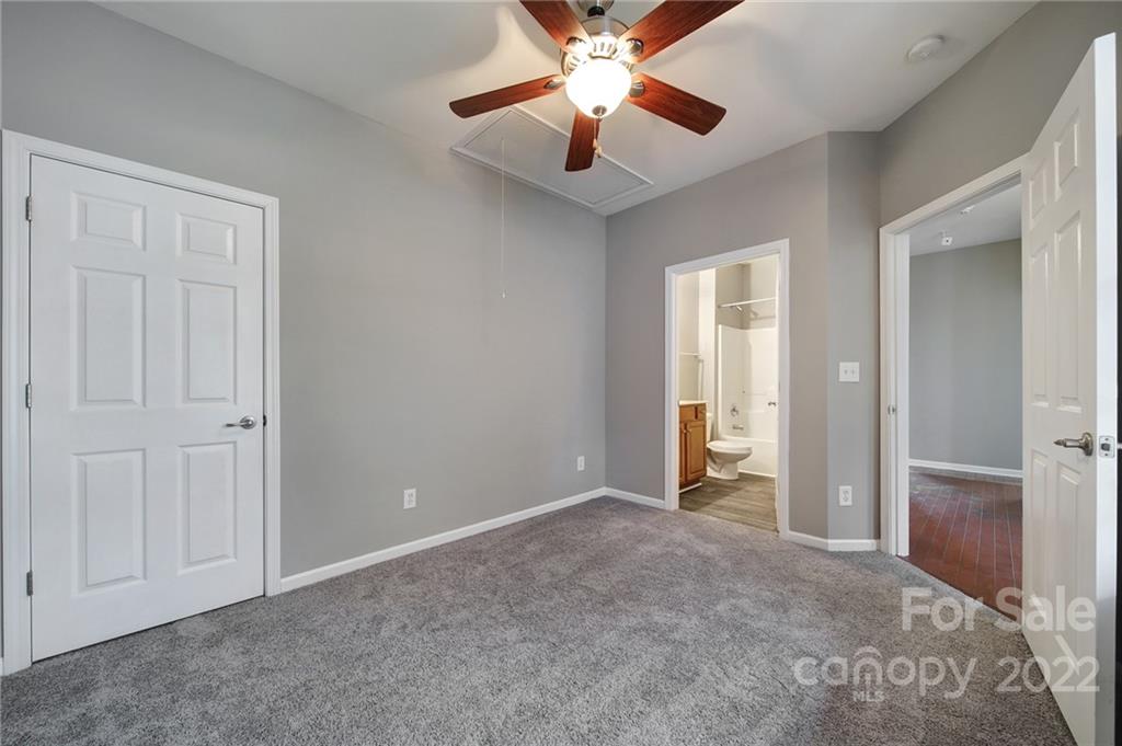1704 Quartz Lane Fort Mill, SC 29708 - Photo 20 of 39 an empty room with closet and a chandelier fan