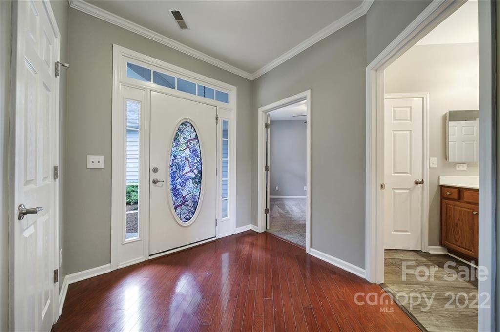 1704 Quartz Lane Fort Mill, SC 29708 - Photo 2 of 39 a view of an entryway with wooden floor