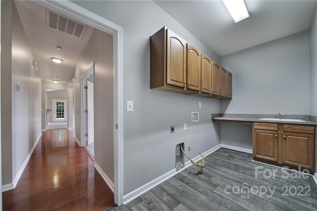 1704 Quartz Lane Fort Mill, SC 29708 - Photo 25 of 39 a view of a kitchen from the hallway