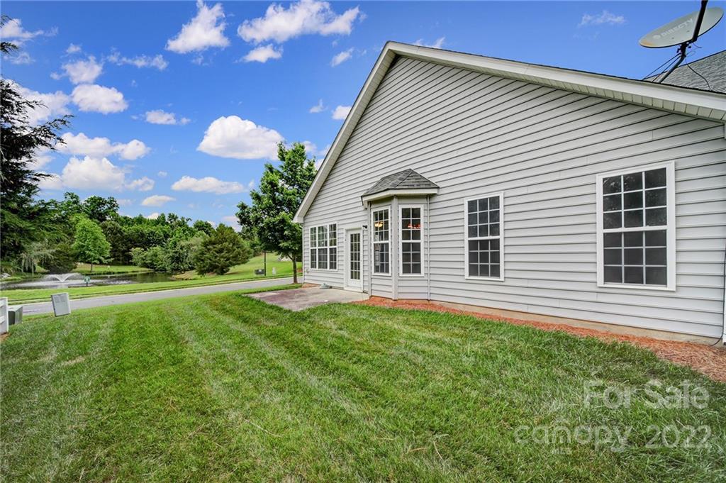 1704 Quartz Lane Fort Mill, SC 29708 - Photo 26 of 39 a front view of a house with a yard