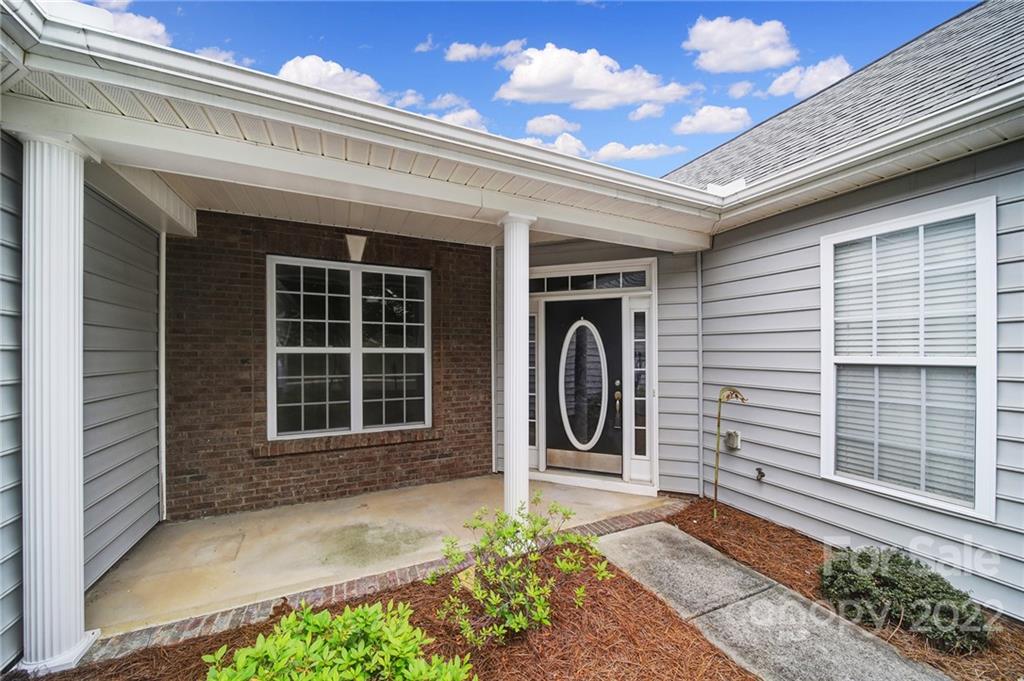 1704 Quartz Lane Fort Mill, SC 29708 - Photo 29 of 39 a front view of a house with a garden