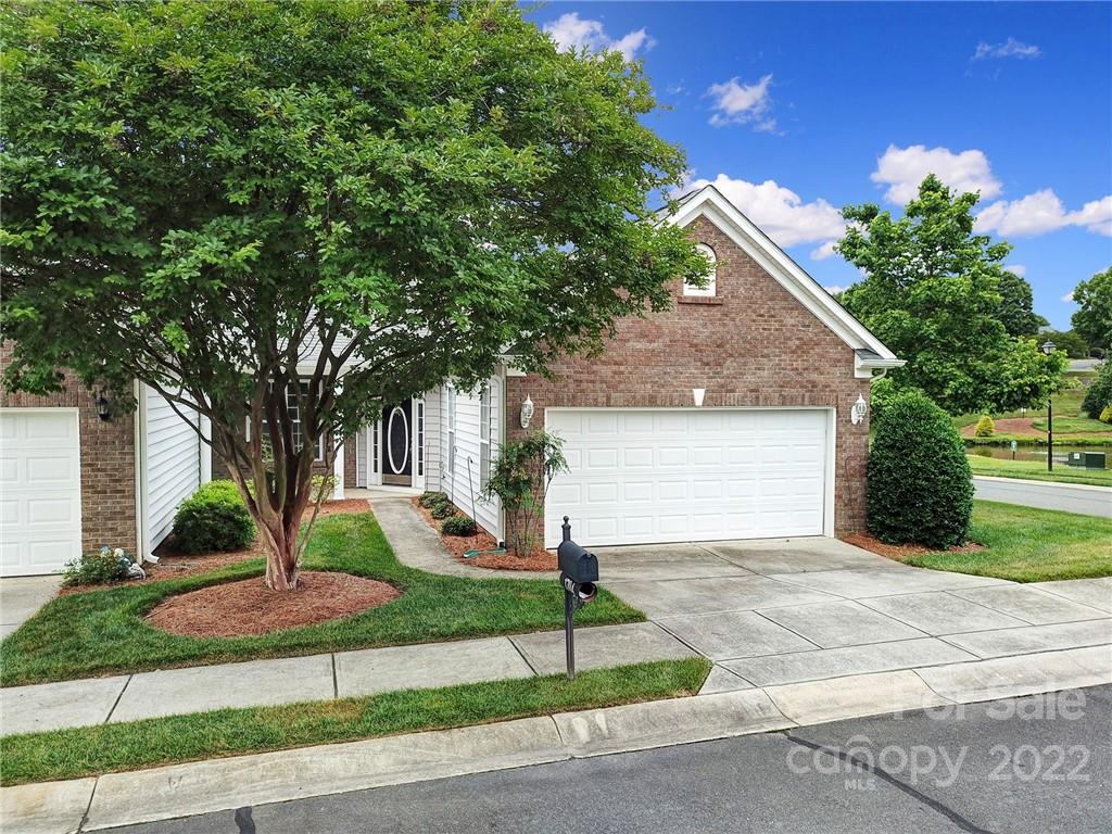 1704 Quartz Lane Fort Mill, SC 29708 - Photo 32 of 39 a front view of a house with a garden