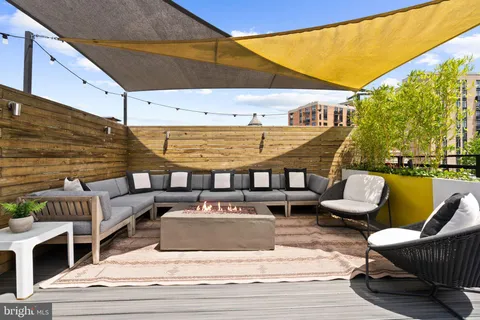a view of a terrace with seating area