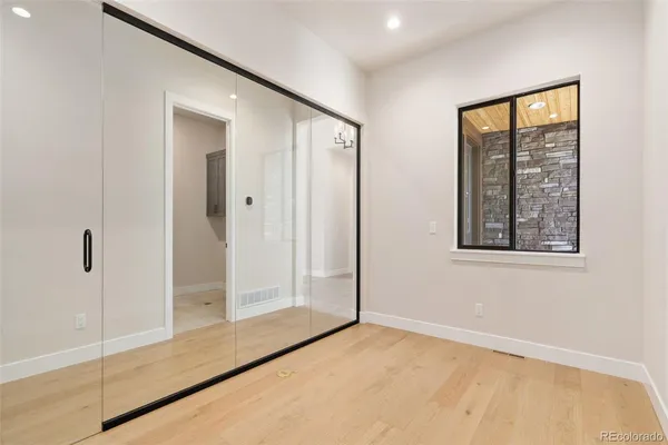 a view of an empty room and window