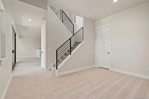 a view of an entryway with staircase