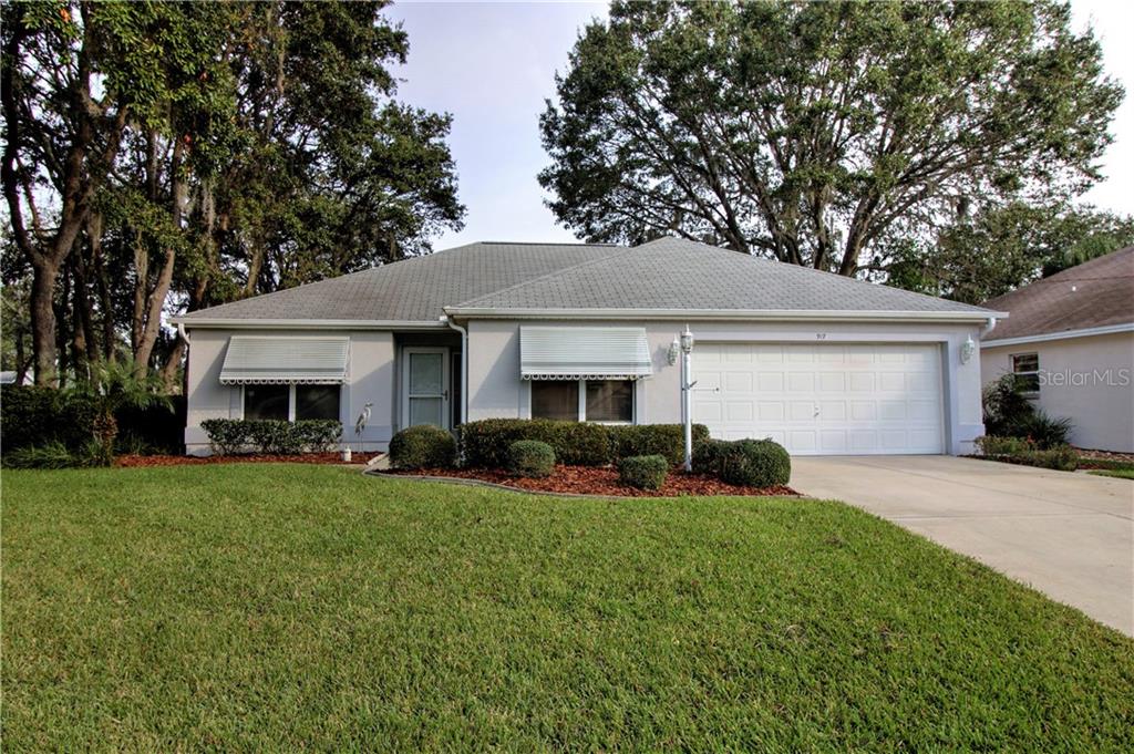 917 Algonquin Road The Villages, FL 32159 - Photo 1 of 1 Front of Very Nice 3/2 CBS JASMINE Designer in Highly Desirable La Reynalda