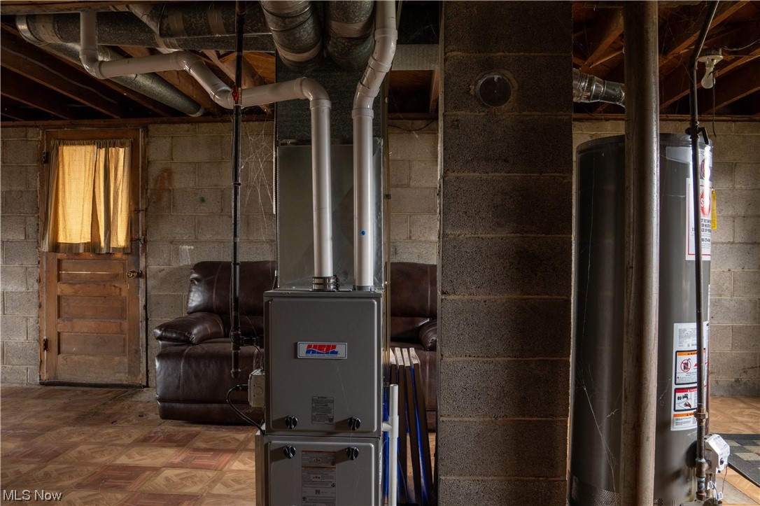 32 Lee Road Painesville, OH 44077 - Photo 11 of 12 Utility room with gas water heater