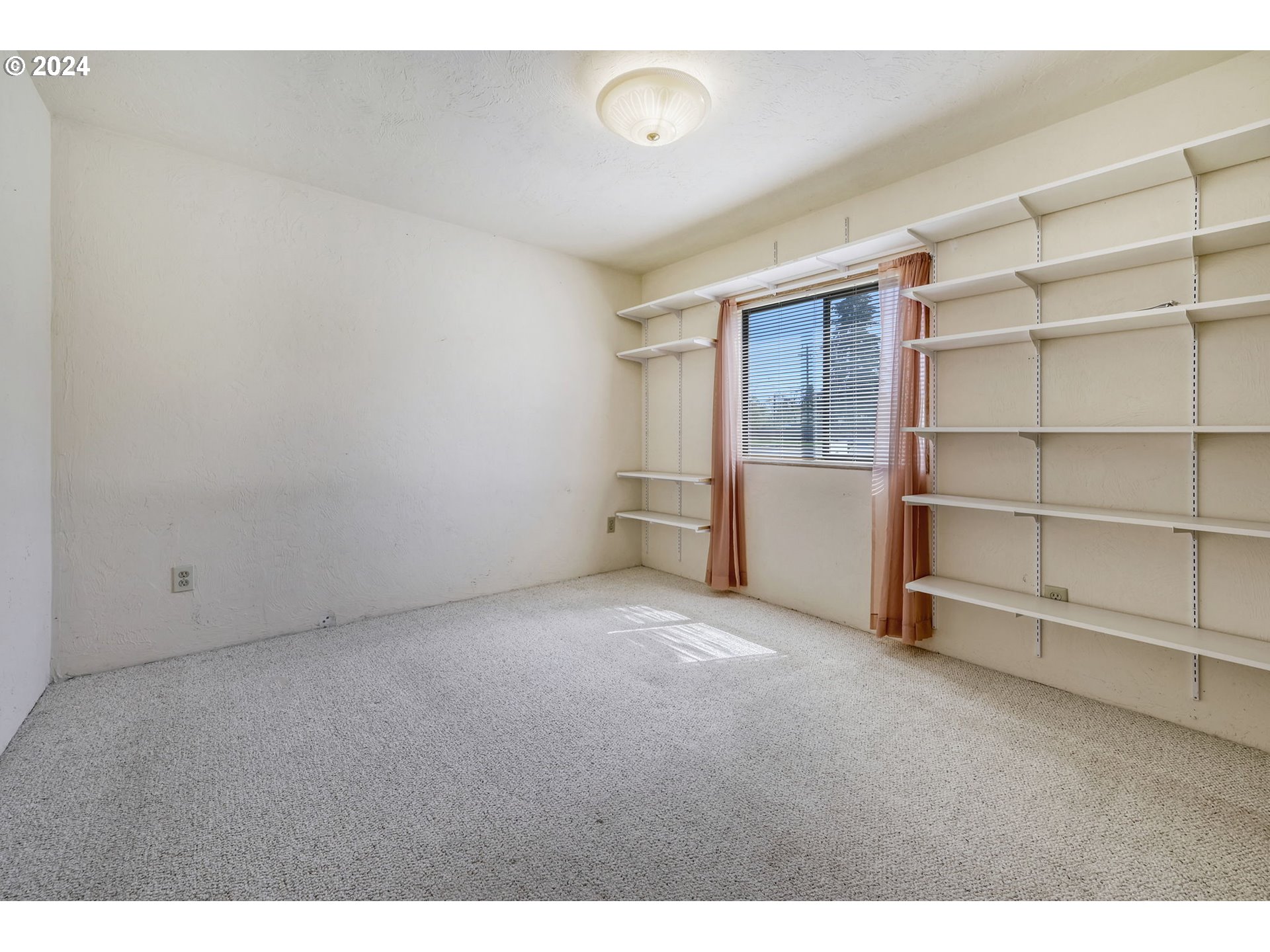 78414 Sears Road Cottage Grove, OR 97424 - Photo 24 of 44 a view of an empty room with a closet