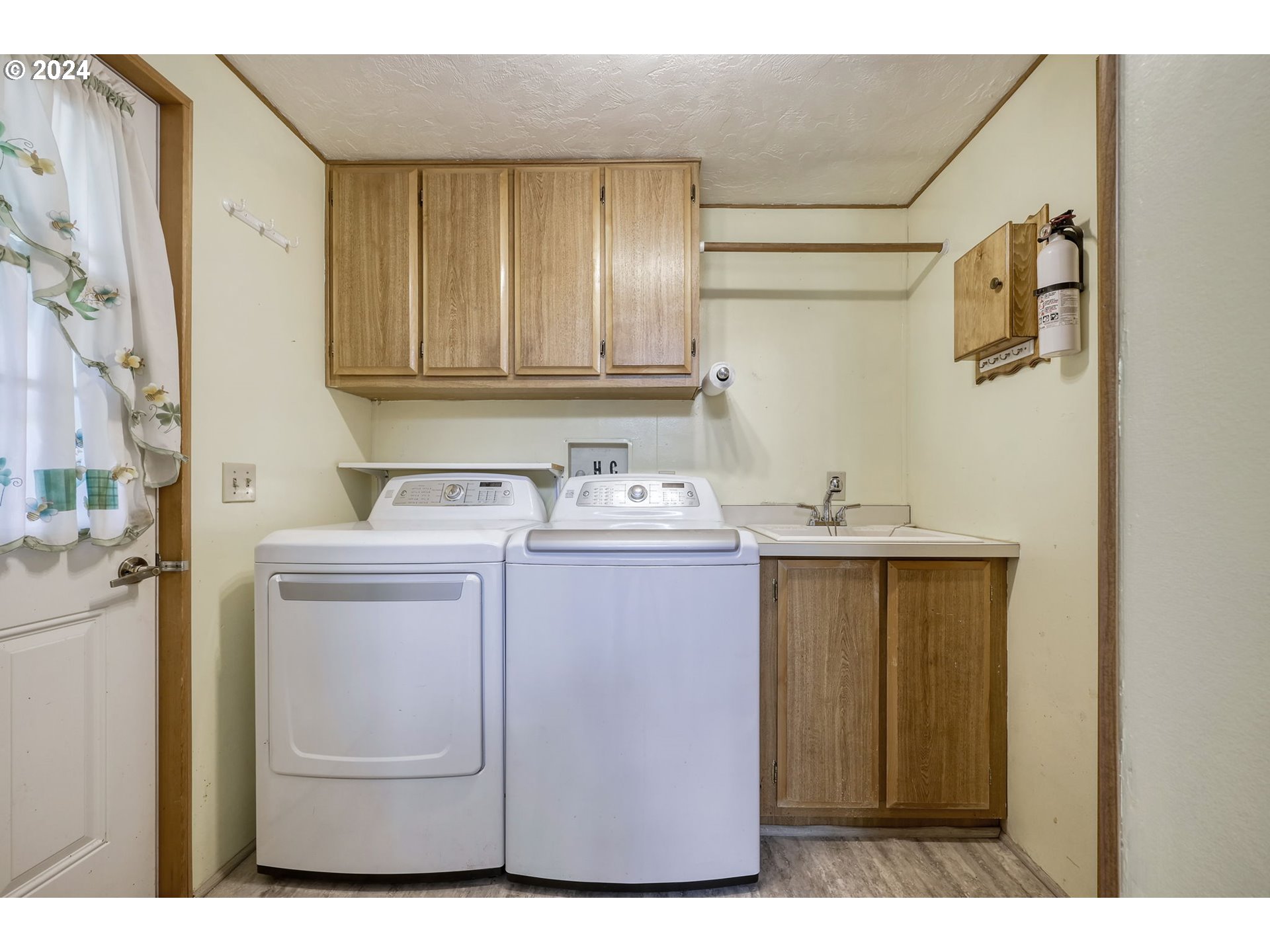 78414 Sears Road Cottage Grove, OR 97424 - Photo 28 of 44 a utility room with closet dryer and washer
