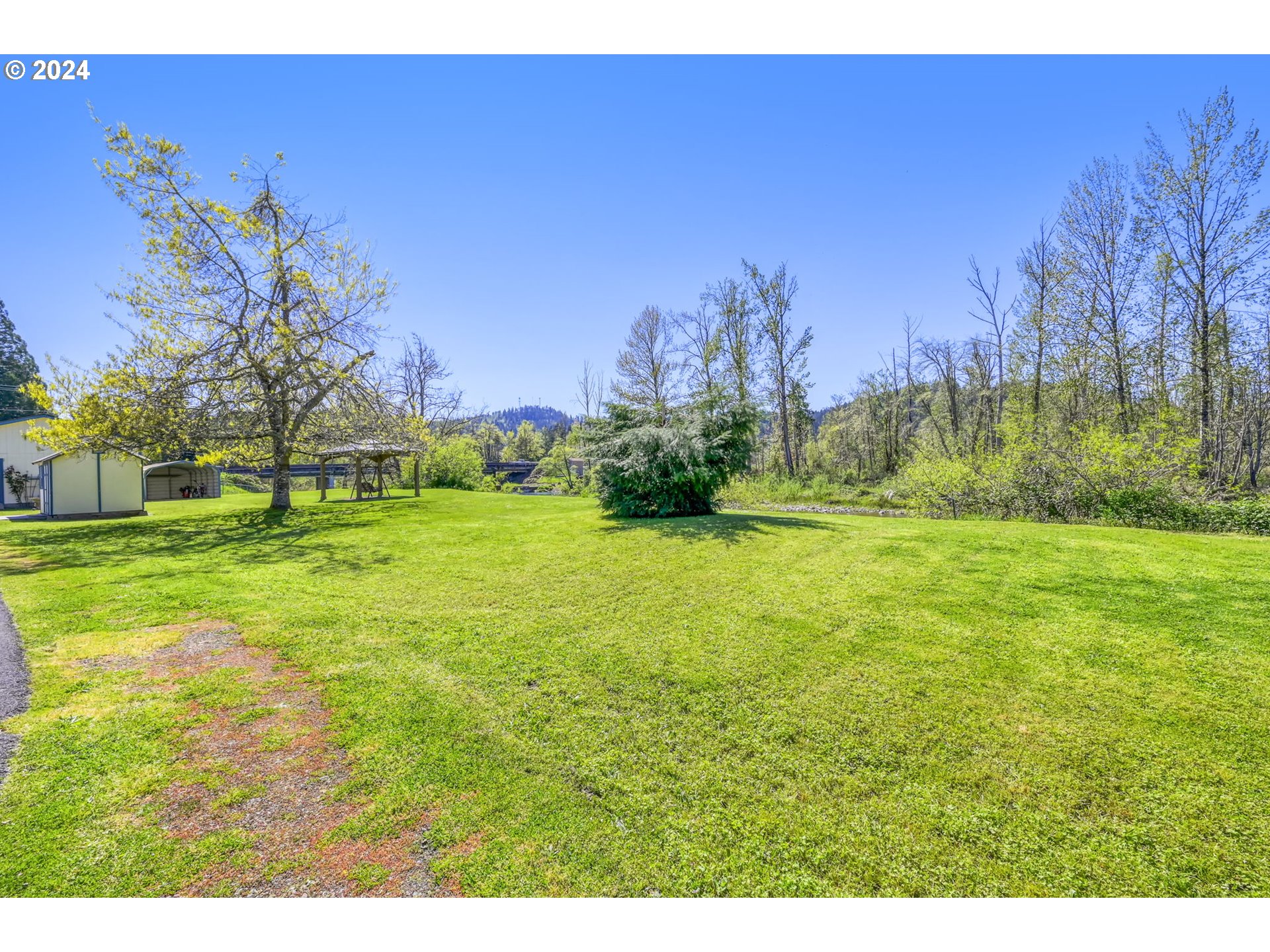 78414 Sears Road Cottage Grove, OR 97424 - Photo 36 of 44 a view of a field with a tree