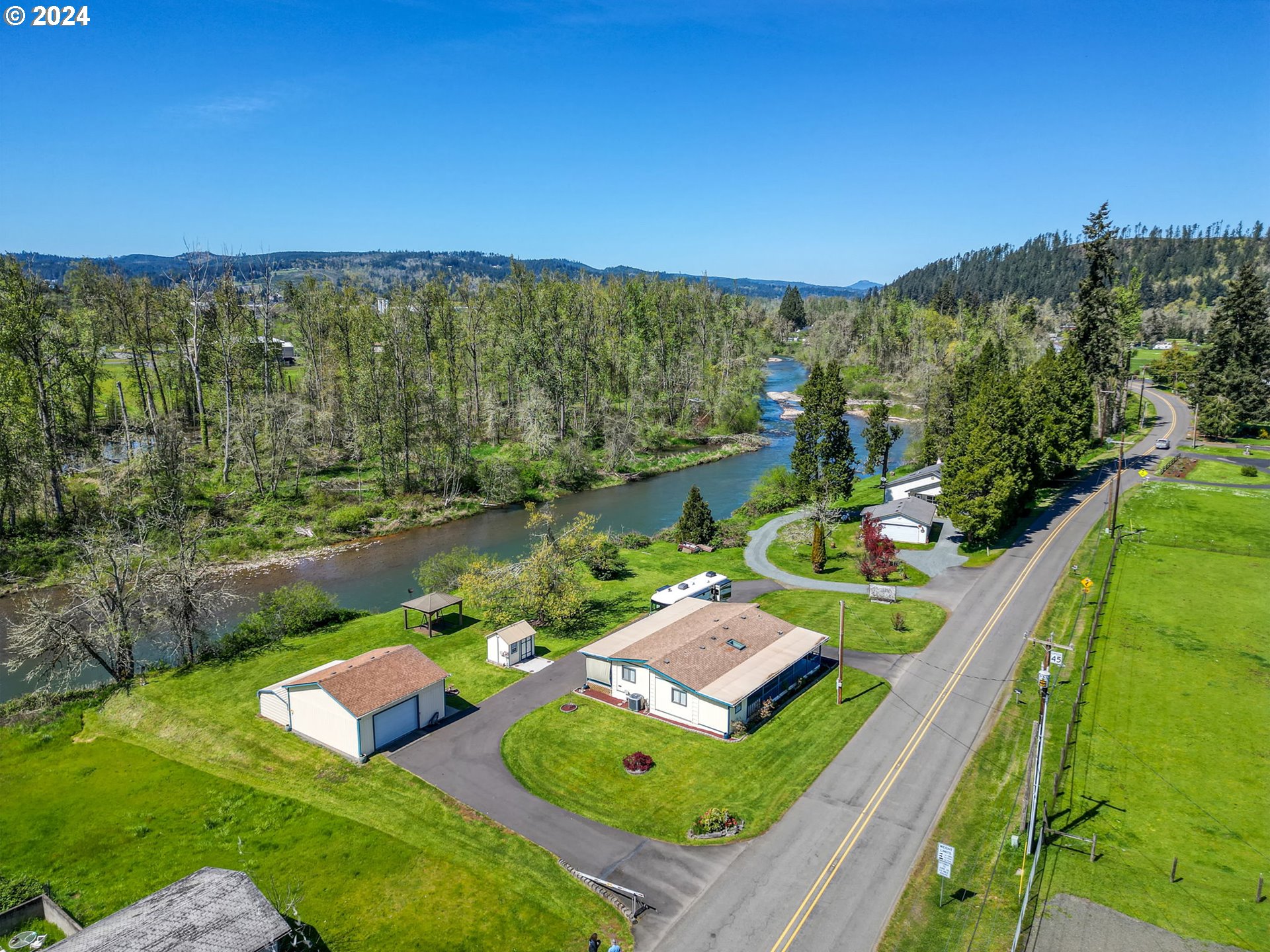 78414 Sears Road Cottage Grove, OR 97424 - Photo 6 of 44 a view of yard from terrace with seating area