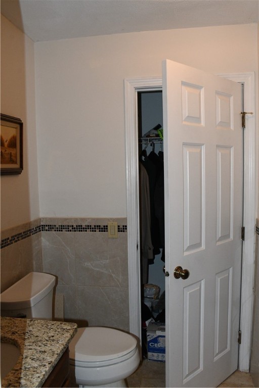 11 Caddy Rock Road, Unit A North Kingstown, RI 02852 - Photo 11 of 20 Half bath with storage closet