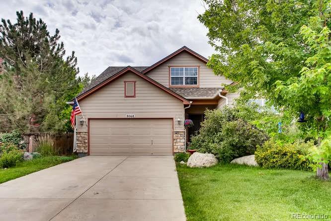 8068 Raspberry Drive Frederick, CO 80504 - Photo 2 of 26 a view of a small house with a yard