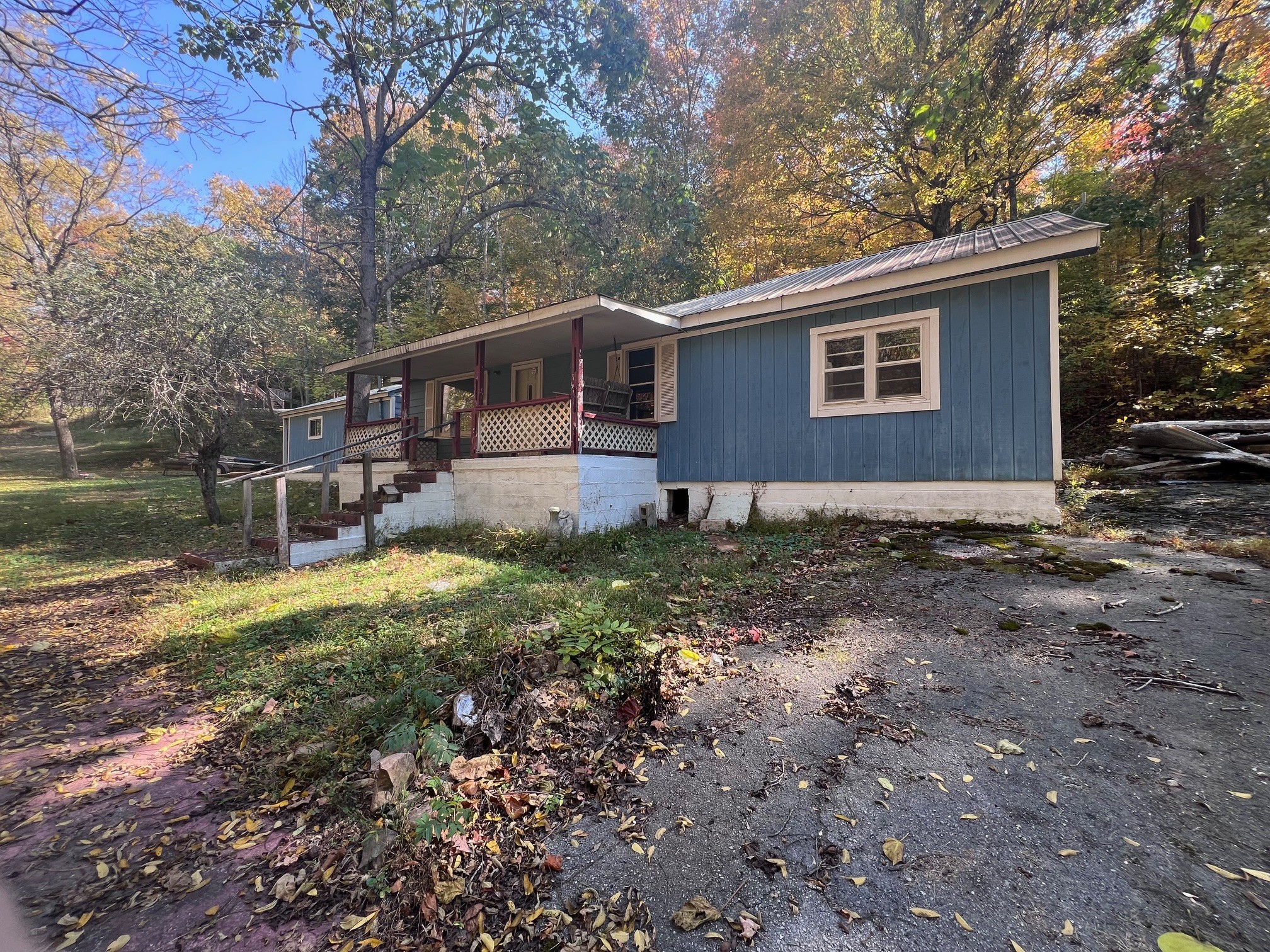 235 Ernest Looper Road Rickman, TN 38580 - Photo 15 of 16 a front view of a house with garden