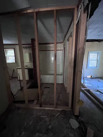a view of entryway with wooden floor