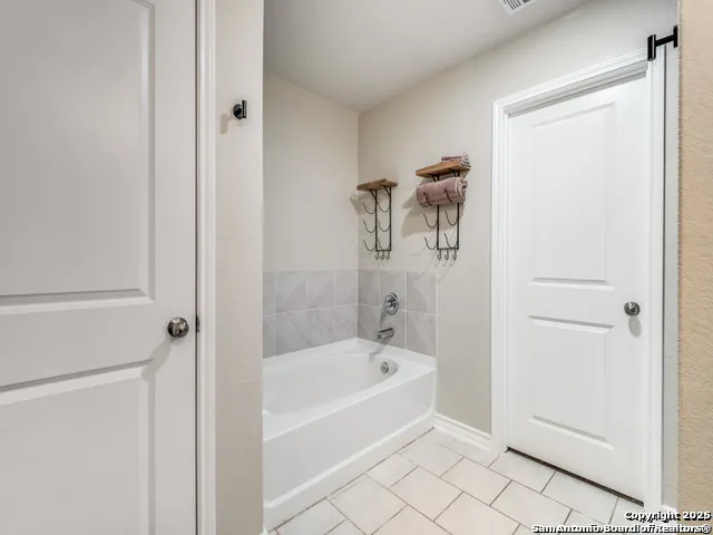 a bathroom with a bathtub