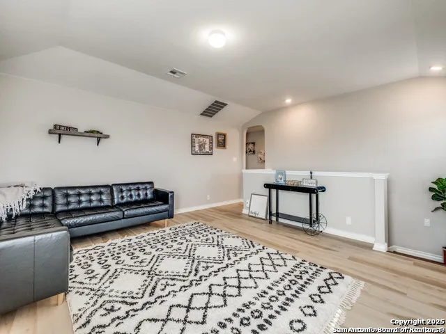 a living room with a couch and a table