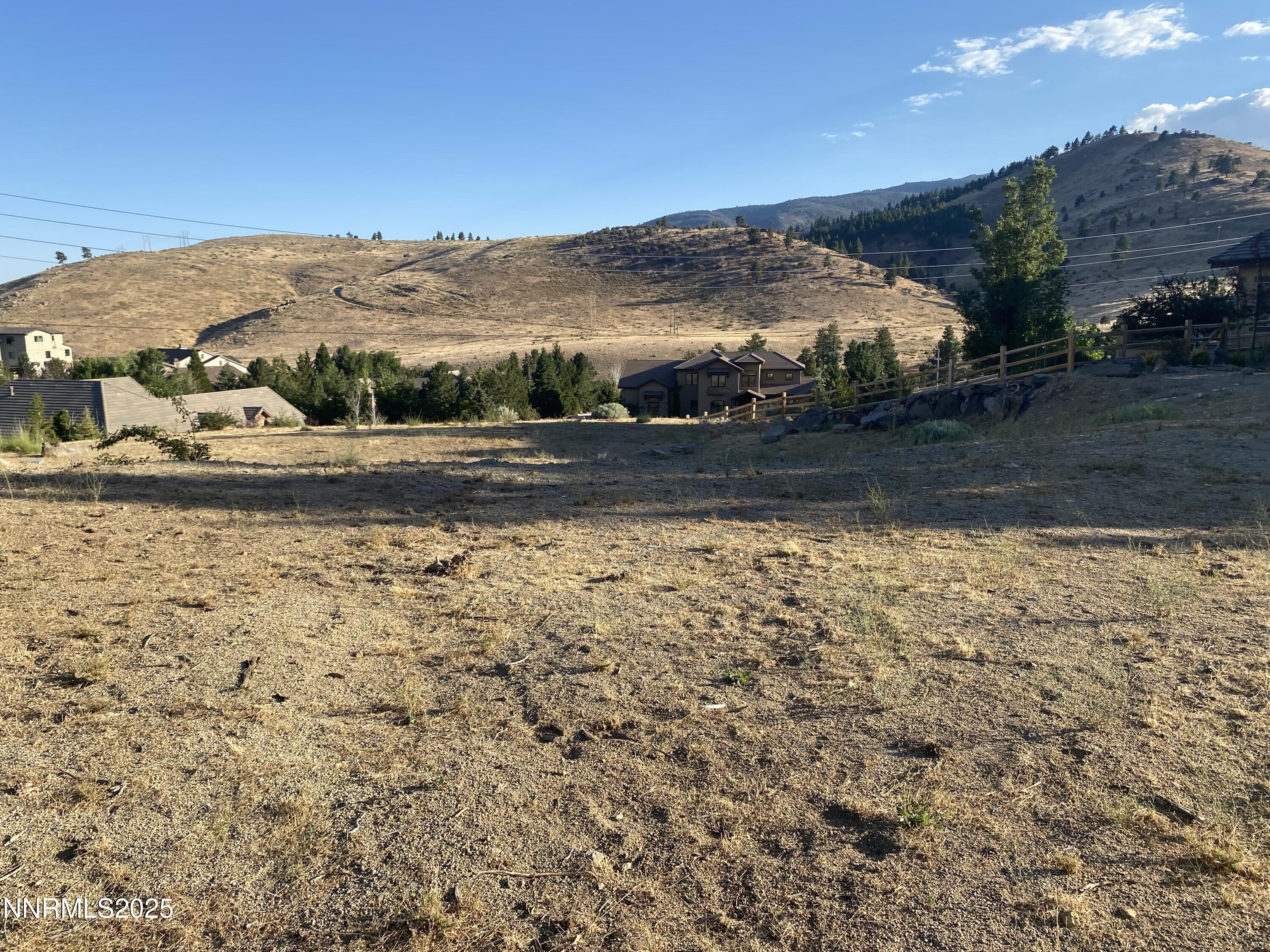 4856 Buckhaven Road Reno, NV 89519 - Photo 4 of 11 a view of a yard with an ocean view
