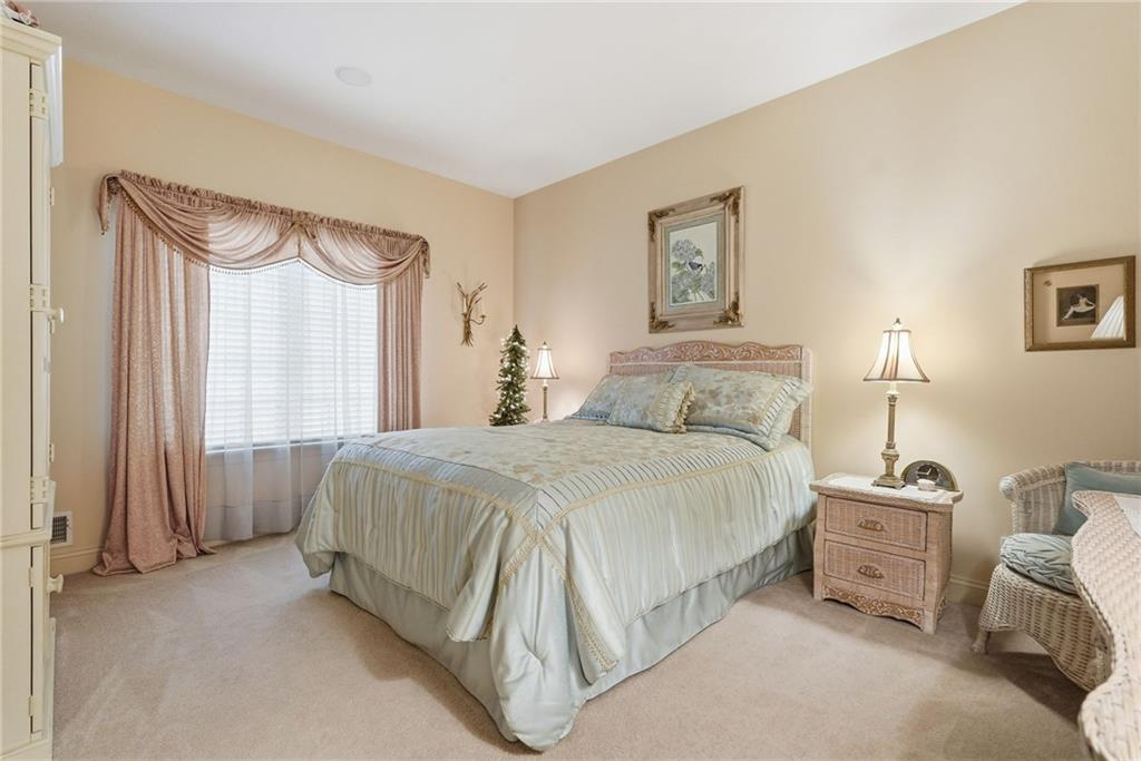174 Springdale Road Venetia, PA 15367 - Photo 30 of 45 a spacious bedroom with a bed and a window