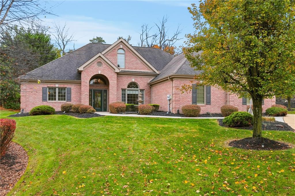 174 Springdale Road Venetia, PA 15367 - Photo 3 of 45 a front view of a house with a yard and trees