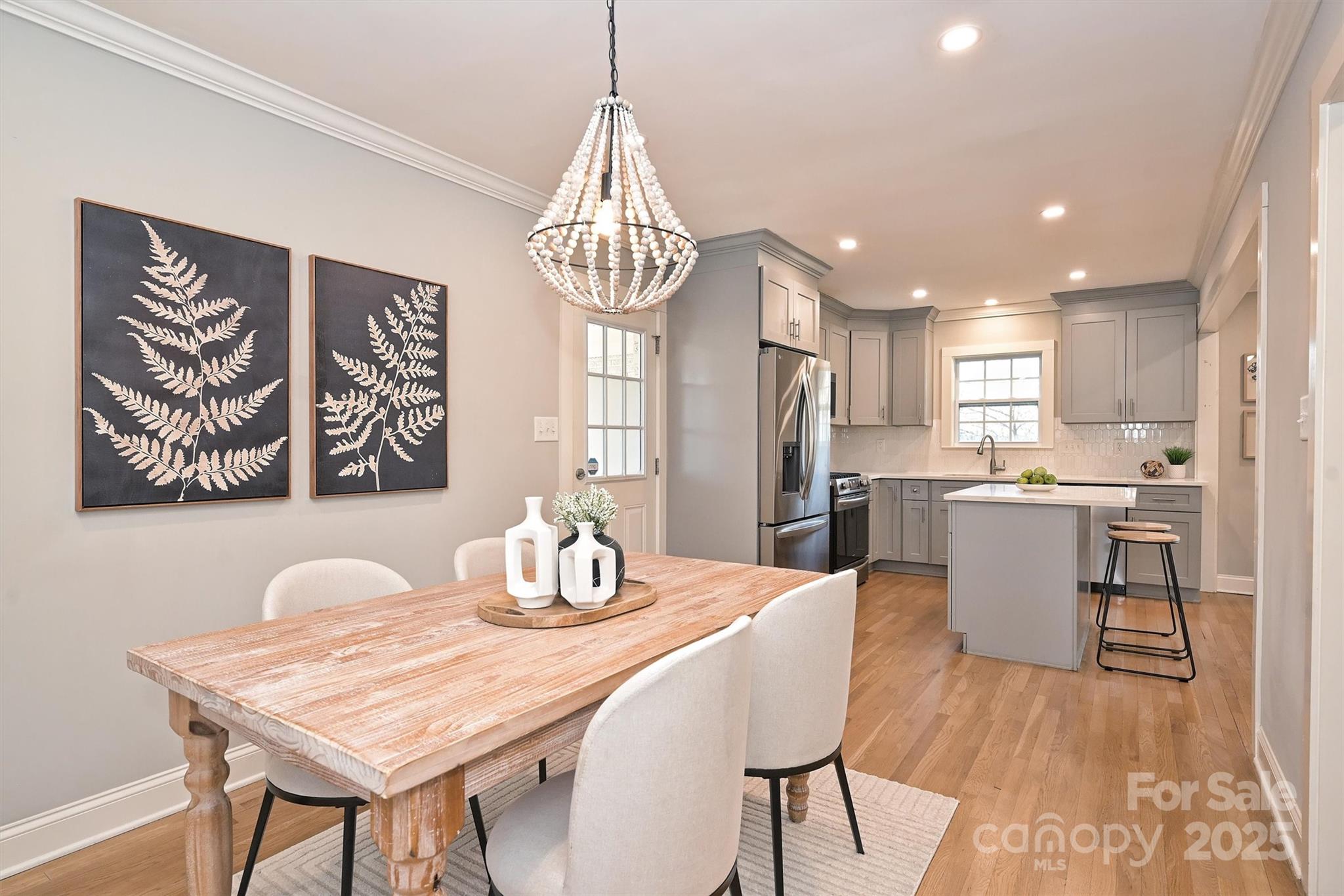 532 Scaleybark Road Charlotte, NC 28209 - Photo 2 of 29 a view of a dining room with furniture window and wooden floor