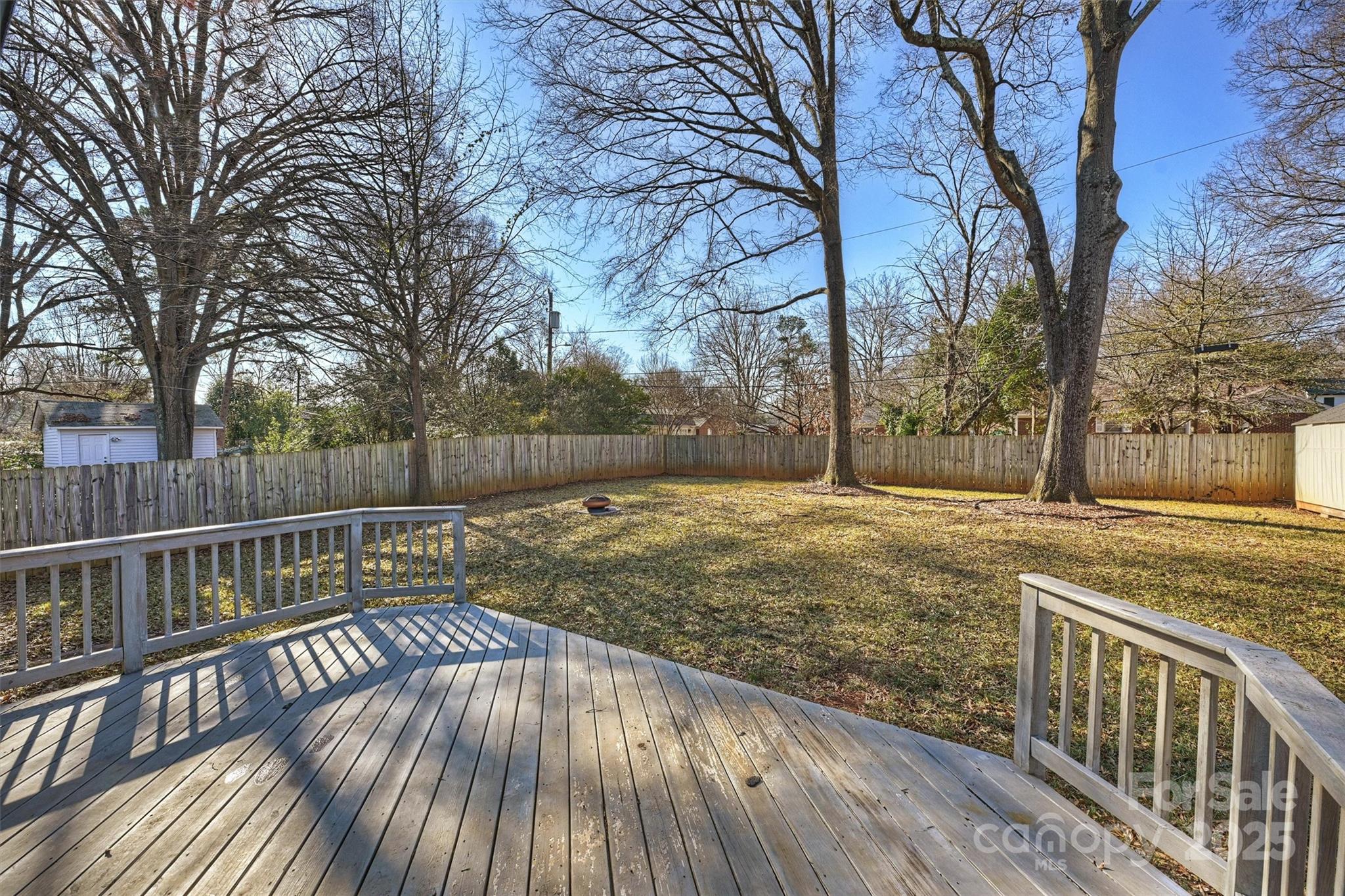 532 Scaleybark Road Charlotte, NC 28209 - Photo 21 of 29 a view of a roof deck with wooden floor and fence