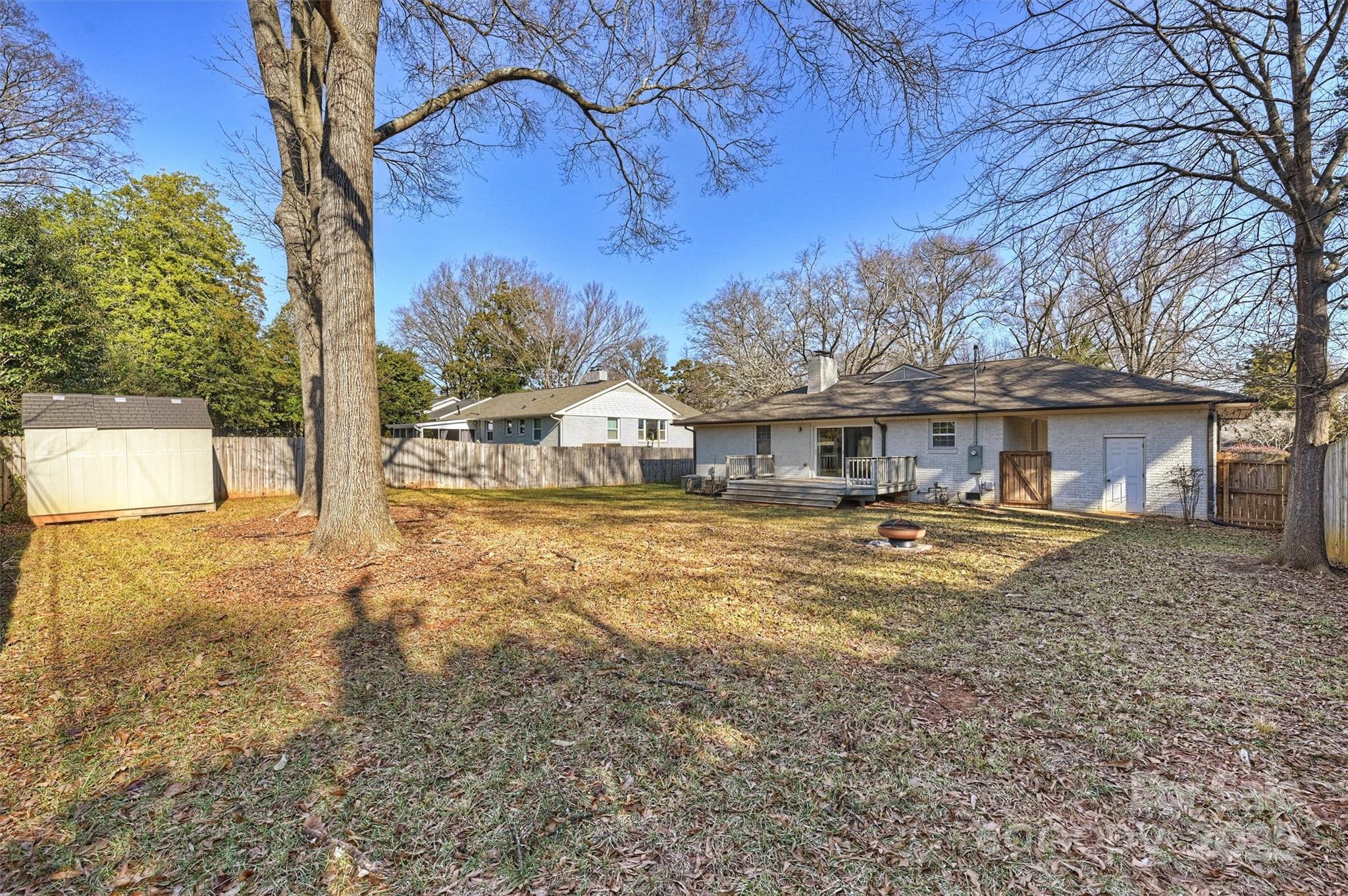 532 Scaleybark Road Charlotte, NC 28209 - Photo 24 of 29 a front view of house with yard space and trees in the background
