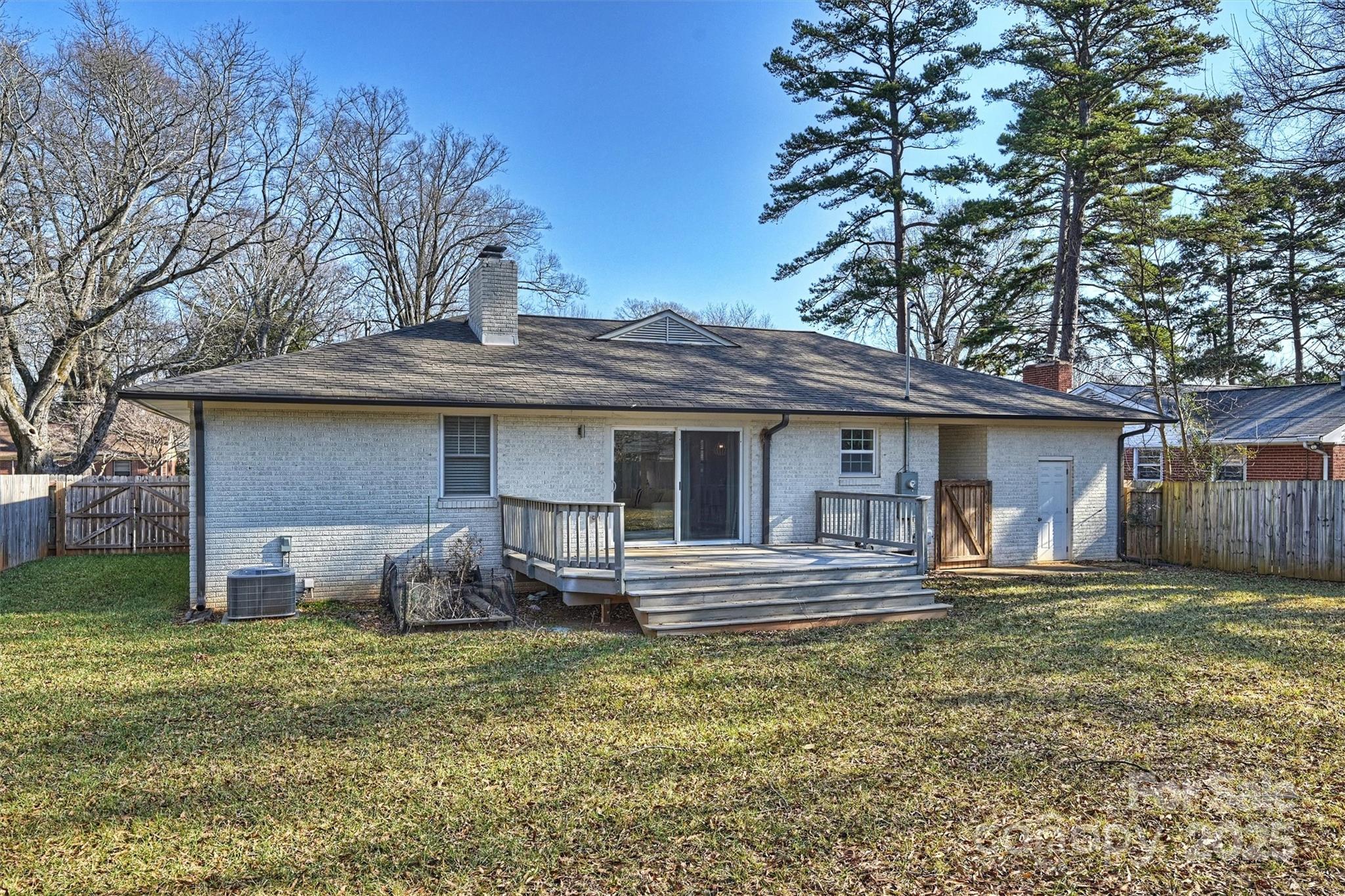 532 Scaleybark Road Charlotte, NC 28209 - Photo 26 of 29 a front view of a house with a yard garage and outdoor seating