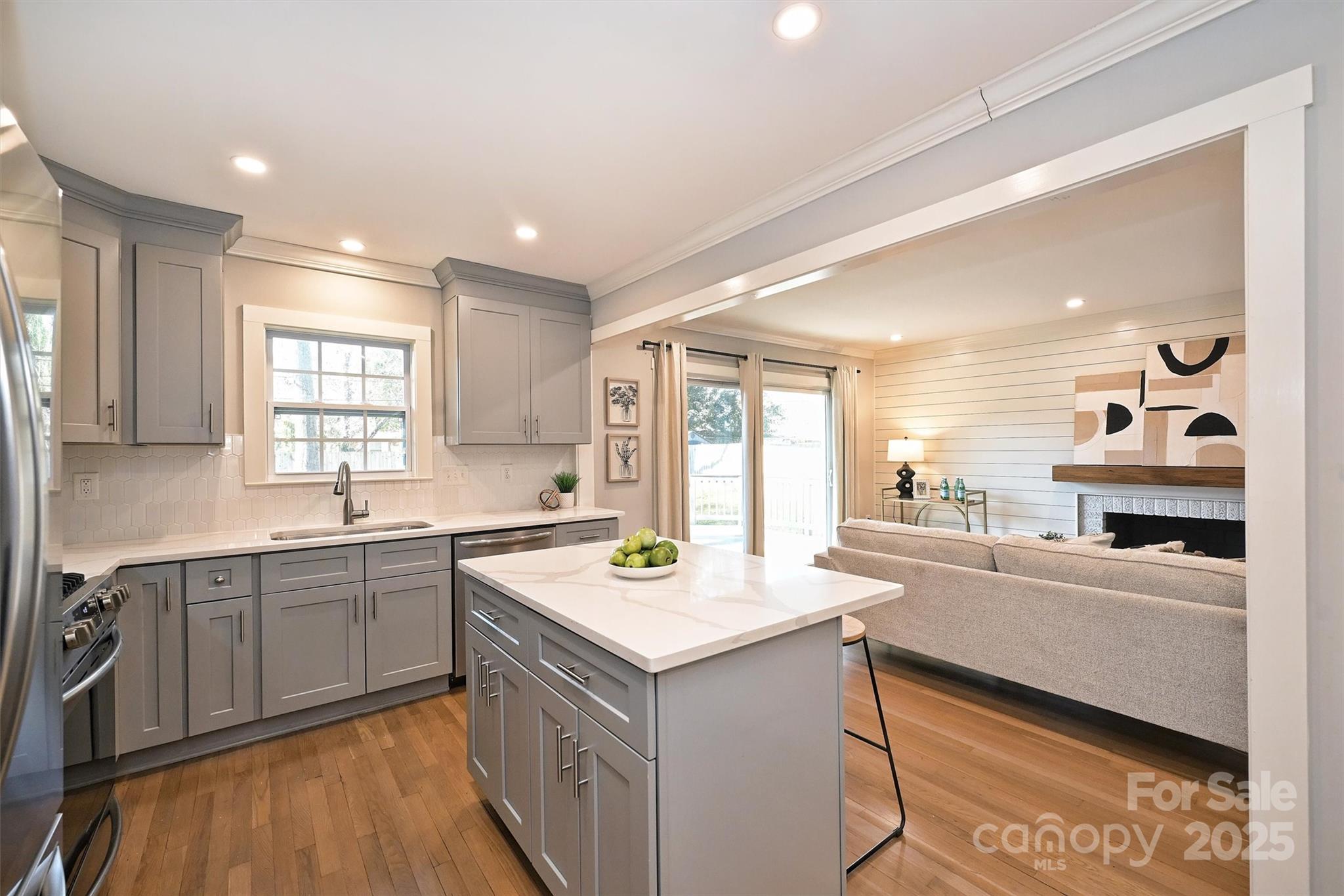 532 Scaleybark Road Charlotte, NC 28209 - Photo 6 of 29 a kitchen with a sink stove and cabinets