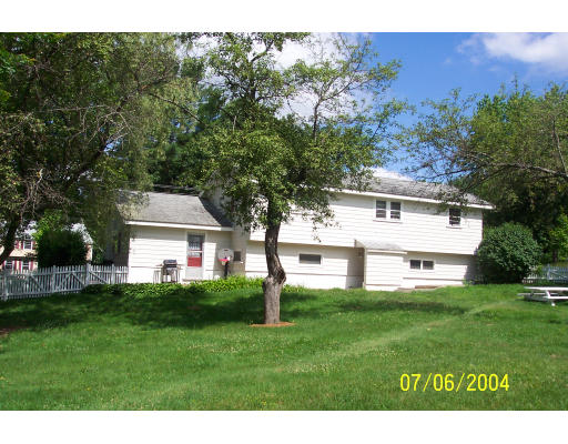 19 Chamberlain Road Chelmsford, MA 01824 - Photo 1 of 9 a house view with a sitting space and garden
