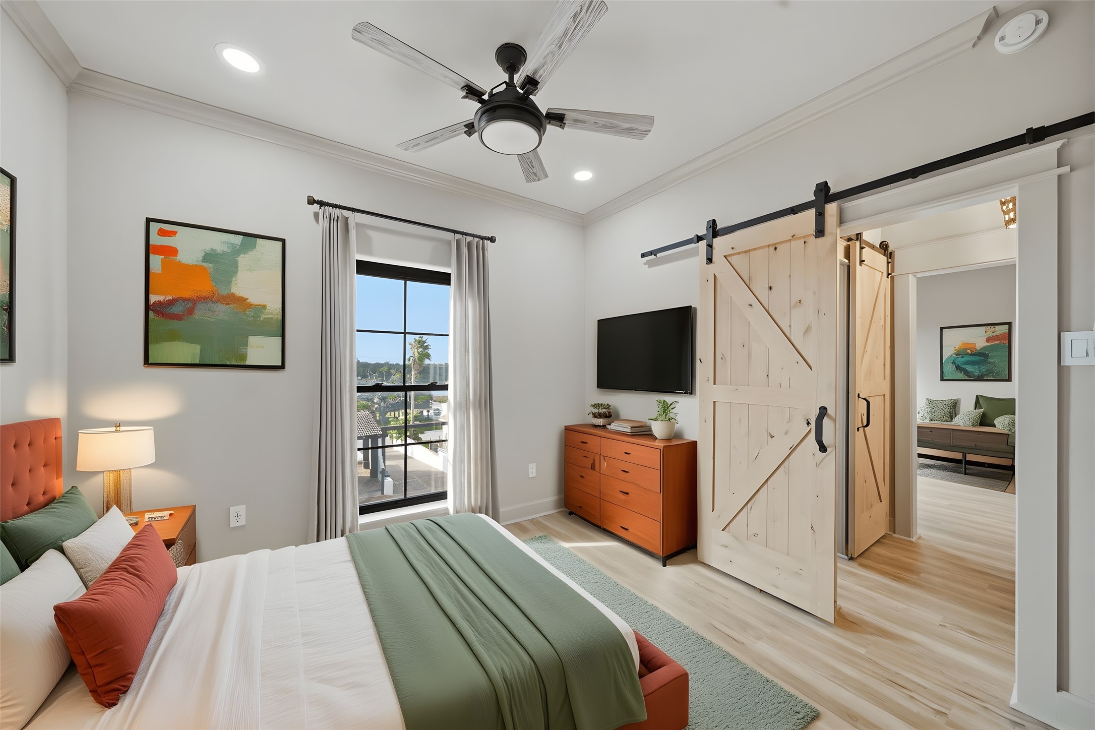 1918 Todville Road Seabrook, TX 77586 - Photo 23 of 41 a bedroom with a bed and a flat screen tv