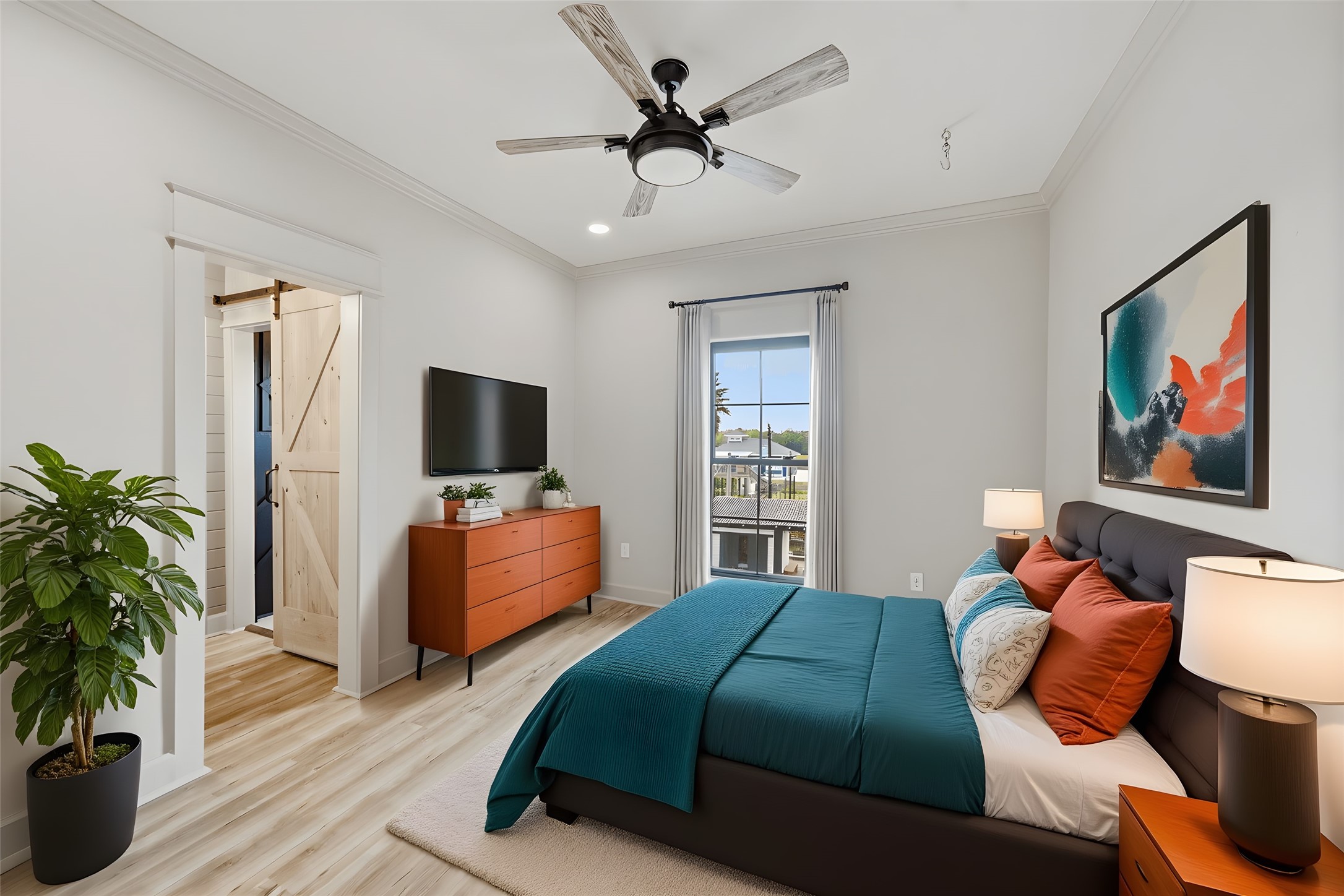 1918 Todville Road Seabrook, TX 77586 - Photo 26 of 41 a bedroom with a bed and a flat screen tv